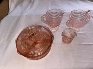 lot 37 image: Variety of Vintage Pink Depression Glass Dishes, Creamer and Matching Sugar and Covered Dish