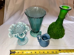 lot 62 image: Mini Fenton Ruffled Hobnail Aqua Blue Vase, Vintage Small Blue Pitcher, Blue Swirl Glass Vase, and Frosted Green Grape Embossed Vase