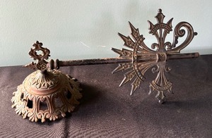 lot 191 image: Two Patina Metal Candle Holders