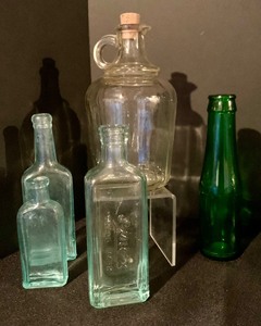 lot 271 image: Variety of Petite Colored Glass Bottles and Pitcher