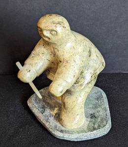lot 111 image: Dimu Carved Stone Inuit Figurine