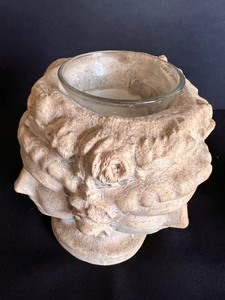 lot 283 image: Vintage Three Faced Cement Candle Holder