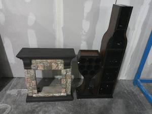 lot 48 image: Faux Fireplace Ceramic Mantle-Broken Platform & Conversation Piece Wine Rack Damaged on top
