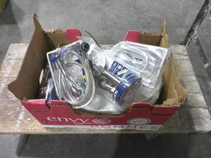 lot 67 image: Mixed Lot of Plumbing Supplies-Shower Heads & Toilet Seats-As-Is