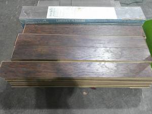 lot 89 image: Lot of Approx. 60 Planks of 6 x 48 Engineered Hardwood-Saddle