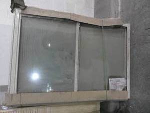 lot 91 image: 60 x 41 34 Tan Color Thermo-Tech Slider Window-Northern Pane-As-Is