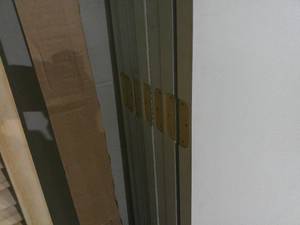lot 104 image: Lot of 7 Primed Hallow Panel Doors 80 x 27-34 Pre Tapped Handle & Hinges
