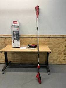 lot 21 image: TORO 60V MAX 10 in. (25.4 cm) Brushless Pole Saw with 2.0 Ah Battery and Charger