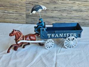 lot 104 image: Charming Cast Iron Transfer Wagon