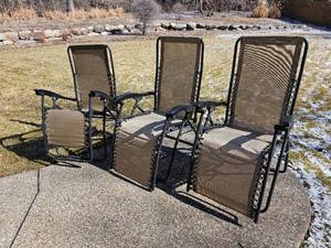 lot 74 image: Cuffy Folding Recliner Group (Quantity Three)