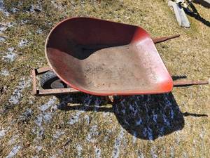 lot 75 image: Rugged Garden Wheel Barrel