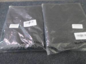 2- 50x80 inch Black Sequinned Table...