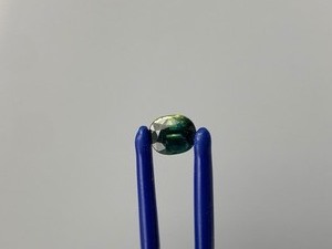 1.08 Carat Yellowish Blue Green Sapphire Faceted Oval Cut