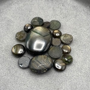 18.90 Carat Black Star Sapphire Oval Cabochon Cut of Assorted Sizes Large Lot of Loose Stones