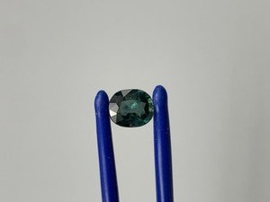 0.98 Carat Bluish Green Sapphire Faceted Oval Cut