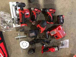 Milwaukee M18 18V Lithium-Ion Cordless Combo Kit (5-Tool) with 2-Batteries, Charger and Tool Bag Customer Returns See Pictures