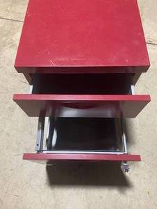 lot 14 image: Lockable Red Metal 2-Drawer File Cabinet on Casters