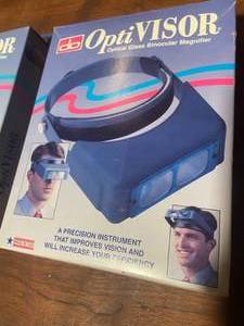 lot 31 image: Donegan OptiVISOR Optical Glass Binocular Magnifier - Two Boxes