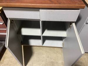 lot 57 image: Wooden Top Metal Cabinet with Drawers and Storage Compartment