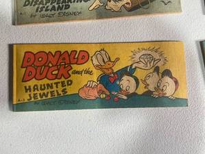 lot 87 image: Vintage Disney Collectible Set - Piggy Bank & Mini Comic Strips