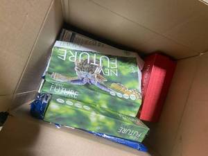 lot 119 image: Assorted Mystery Box with Books, Textile, and Household Items