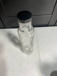 lot 262 image: Vintage Clear Glass Rolling Pin with Black Lid