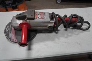 lot 130 image: Milwaukee Heavy Duty 9 Angle Grinder
