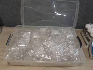 Tote of empty storage Bottles