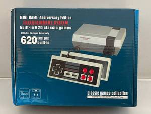 lot 90 image: Pre-owned Mini Game Anniversary Edition Entertainment System With Built-In 620 Classic Games (Missing Cords)