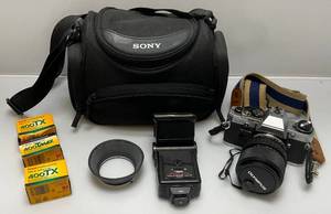 lot 117 image: Vintage Olympus OM10 35MM Camera With Case & More