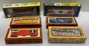 lot 197 image: Misc. Vintage HO Scale Train Cars In Original Boxes Including  C&H Sugar And More (Some Boxes Beat Up)