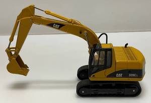 lot 134 image: Vintage 170 Scale Norscot Group Inc. Die-Cast Cat  320CL Excavator