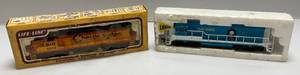 lot 189 image: Vintage HO Scale The Rock 4425 Engine & Chessie System B&O 4810 With Original Box (Pre-Owned) Lighted Untested