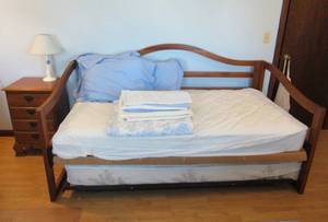 Trundle Bed with twin mattresses Nightstand and Lamp group  Blue color theme