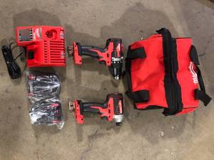 Milwaukee M18 18V Lithium-Ion Brushless Cordless Compact DrillImpact Combo Kit (2-Tool) W (2) 2.0Ah Batteries, Charger & Bag  Customer Returns See Pictures