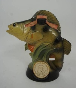 lot 9 image: Vintage Jim Beam Bourbon Whiskey Decanter Bass Fish Regal China with Official Seal National Fresh Water Fishing Hall of Fame Hayward, WI