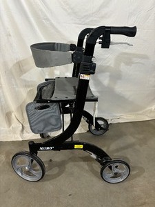 lot 25 image: MSRP $300 Drive RTL10266BK-T Nitro Foldable Rollator Walker Adjustable Height 300lb Weight Capacity - Black - Great Working Condition