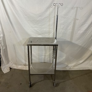 lot 32 image: Stainless Steel Surgical Tool Table with Height Adjustable 2-Ram Hook I.V. Pole - In Great Condition
