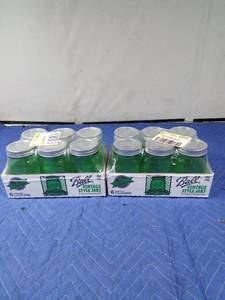 lot 428 image: 2 cases vintage style green canning jars
