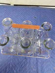 lot 11 image: Vintage wire milk carrier with milk bottles