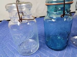 lot 13 image: 2 Vintage clear and 1 green canning jars