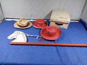 lot 27 image: Hobby horse and 2 vintage cowboy hats and a vintage hat and box