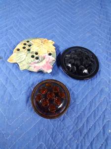 lot 32 image: Vintage Weller Maple leaf leaves, black glass, and amber glass flower frogs