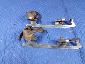 lot 56 image: Antique cast steel ice skates