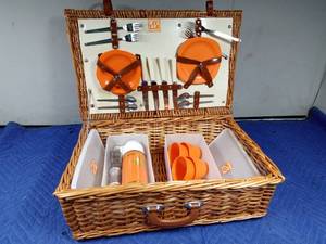 lot 93 image: Optima Co. picnic basket with dishes