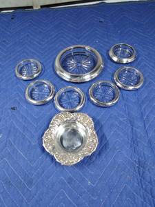 lot 98 image: Sterling silver dish and a coaster set