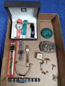 lot 106 image: Watches, cuff links with markings and Duluth Depot belt buckle