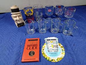 lot 109 image: W. C. Fields liquor decanter, beer glasses, drink mixers and bartender guides