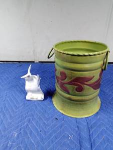 lot 121 image: Lladro Society statue and a lg metal can