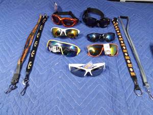 lot 154 image: New sunglasses, goggles and lanyards